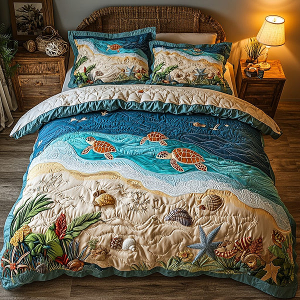 Sea Journey quilted 3-piece bedding set on a made bed in a light coastal bedroom