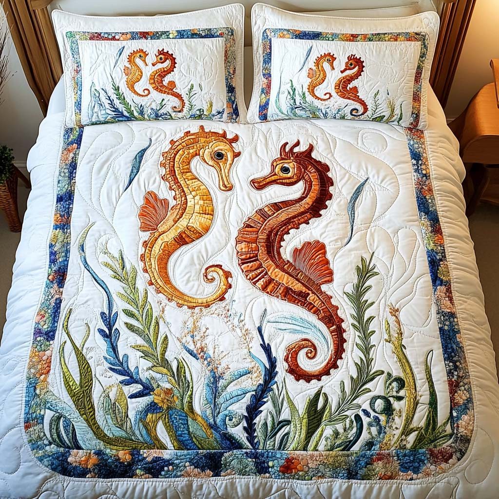 Seaside Love quilted 3-piece bedding set on a made bed in a light coastal bedroom