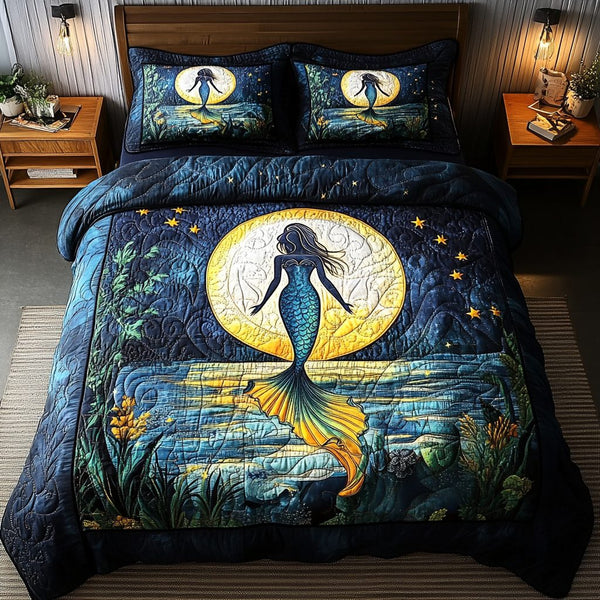 Seaside Song quilted 3-piece bedding set on a made bed in a light coastal bedroom