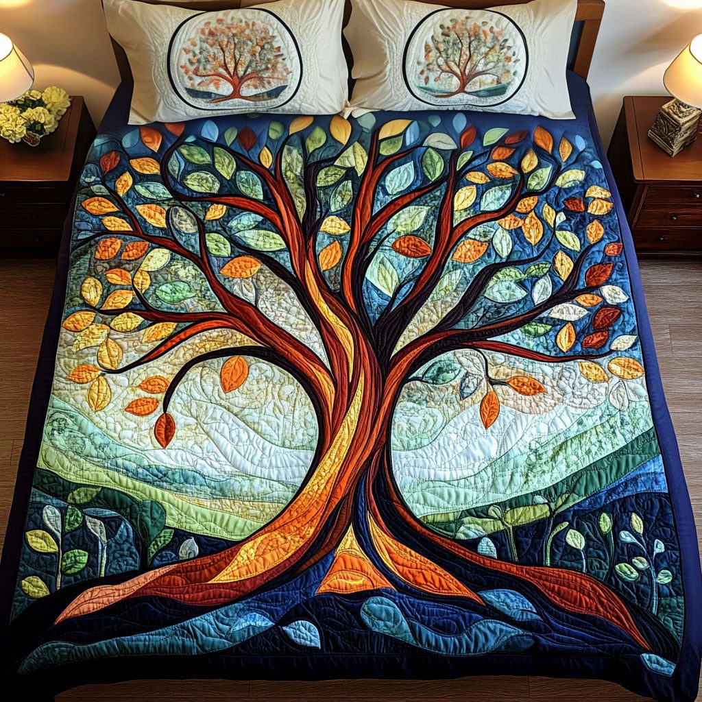 Seeds of Unity quilted 3-piece bedding set on a made bed with two matching pillow shams
