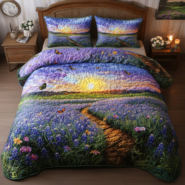 Serene Bluebonnet quilted 3-piece bedding set on a made bed with two matching pillow shams