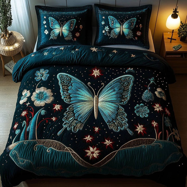 Serene Flight quilted 3-piece bedding set on a made bed with two matching pillow shams