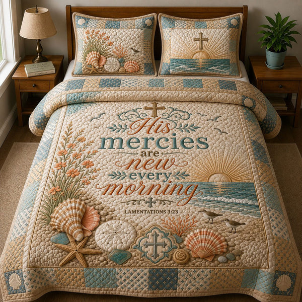 Shells Bible Quote quilted 3-piece bedding set on a made bed in a softly lit bedroom