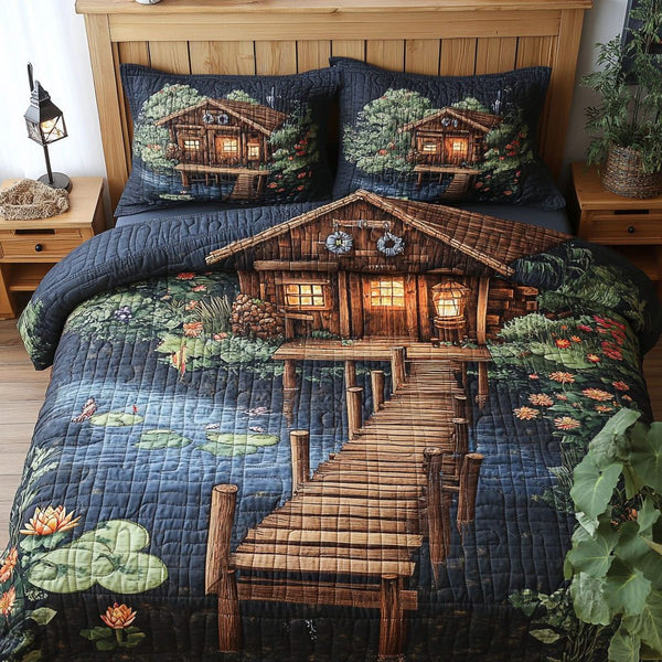 Shimmering Shore Shack quilted 3-piece bedding set on a made bed in a light coastal bedroom