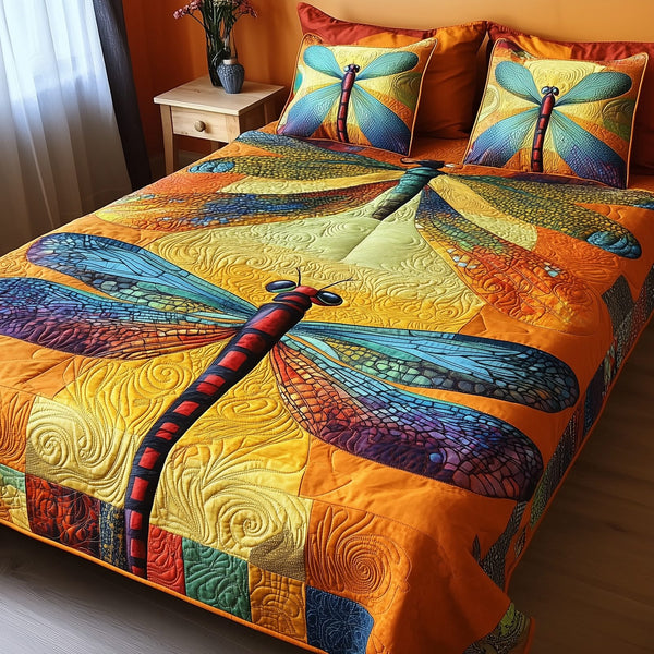 Shining Dragonfly quilted 3-piece bedding set on a made bed with two matching pillow shams