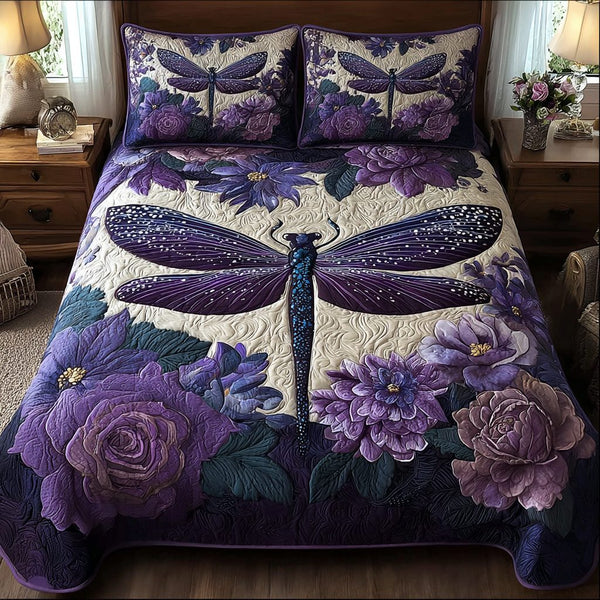 Shining Dragonfly quilted 3-piece bedding set on a made bed with two matching pillow shams