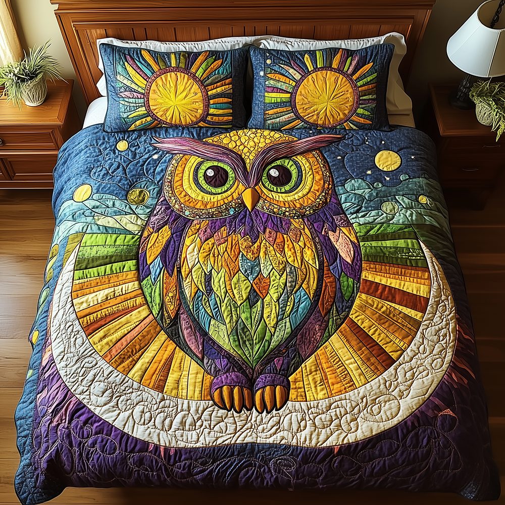 Shining Owl quilted 3-piece bedding set on a made bed with two matching pillow shams
