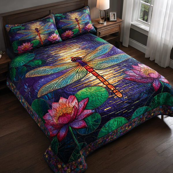 Shiny Dragonfly quilted 3-piece bedding set on a made bed with two matching pillow shams