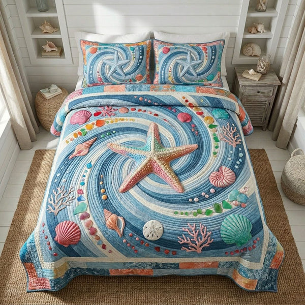 Shoreline Stars quilted 3-piece bedding set on a made bed in a light coastal bedroom