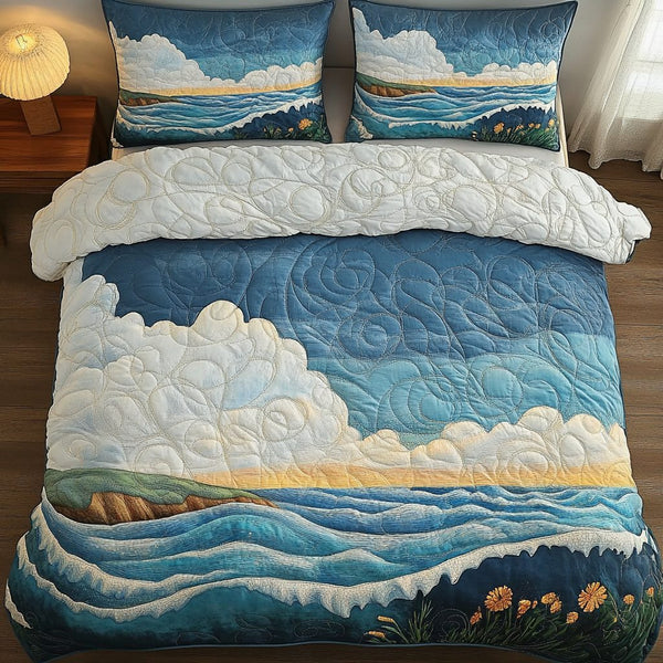 Silent Shores quilted 3-piece bedding set on a made bed in a light coastal bedroom