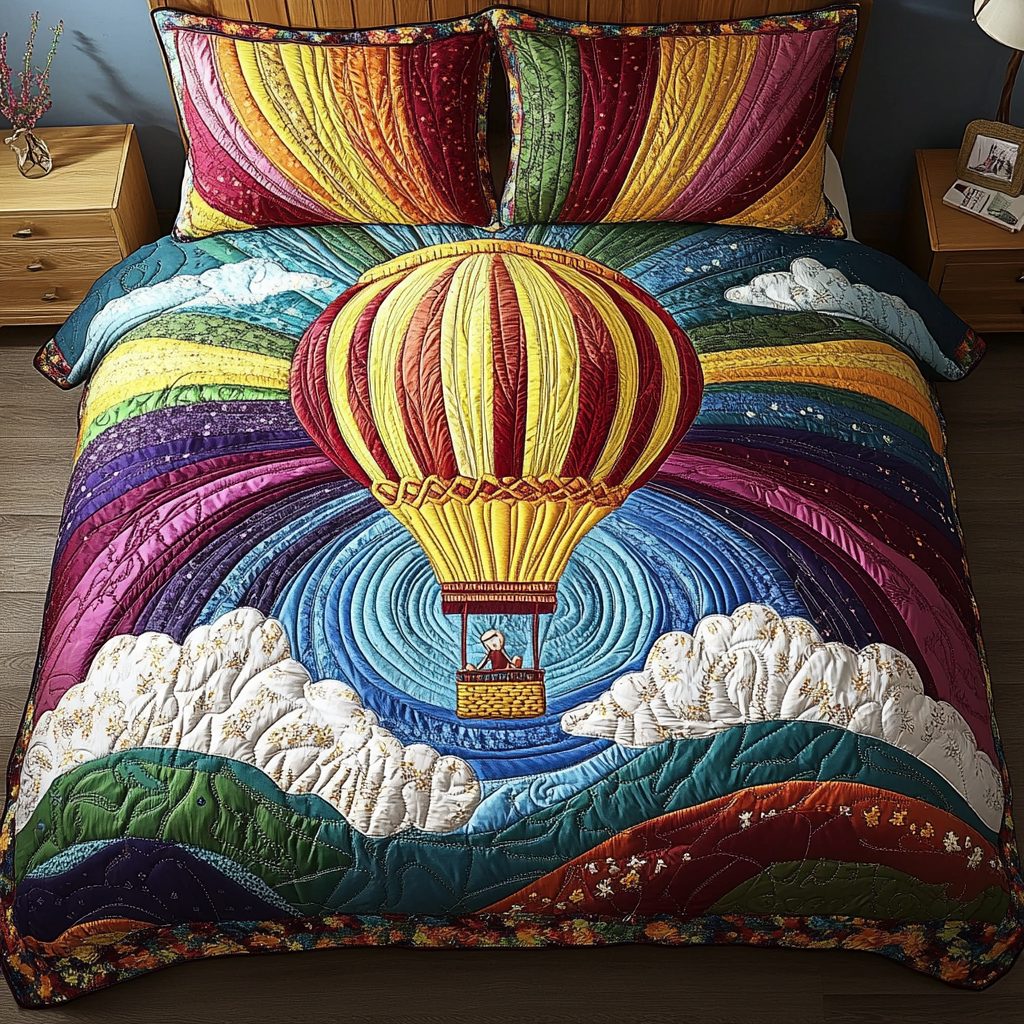 Sky Drifter quilted 3-piece bedding set on a made bed with two matching pillow shams