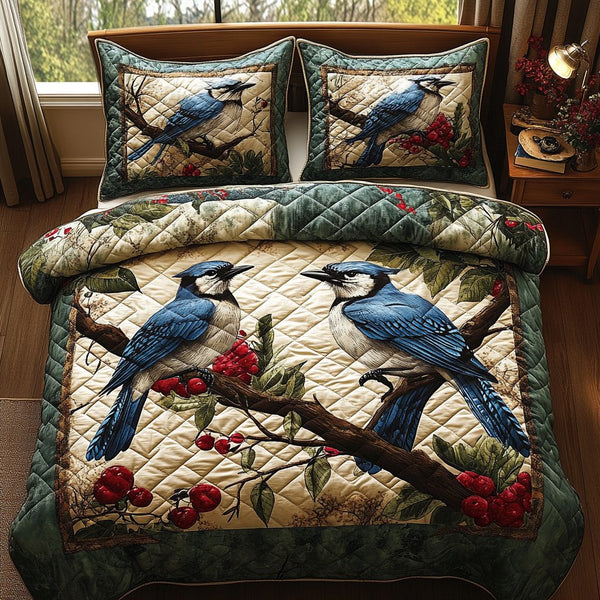 Sky Feather quilted 3-piece bedding set on a made bed with two matching pillow shams
