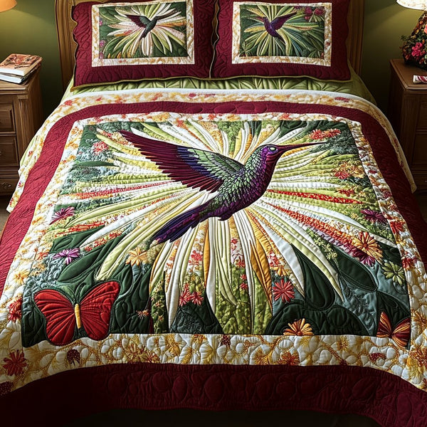Sky Feathers quilted 3-piece bedding set on a made bed with two matching pillow shams