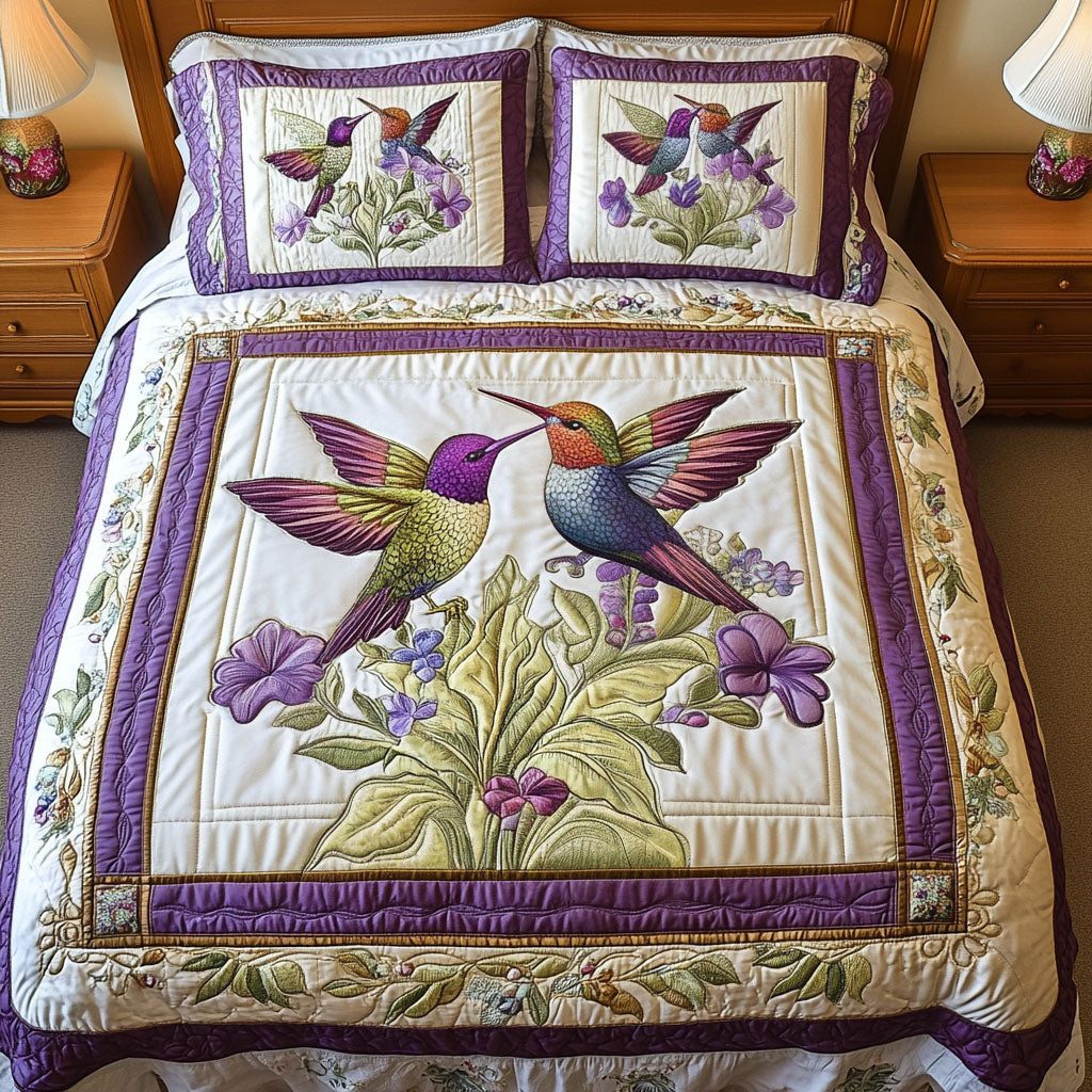 Sky Serenade quilted 3-piece bedding set on a made bed with two matching pillow shams