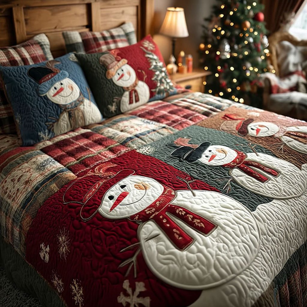 Snow Giggles quilted 3-piece bedding set on a made bed with two matching pillow shams