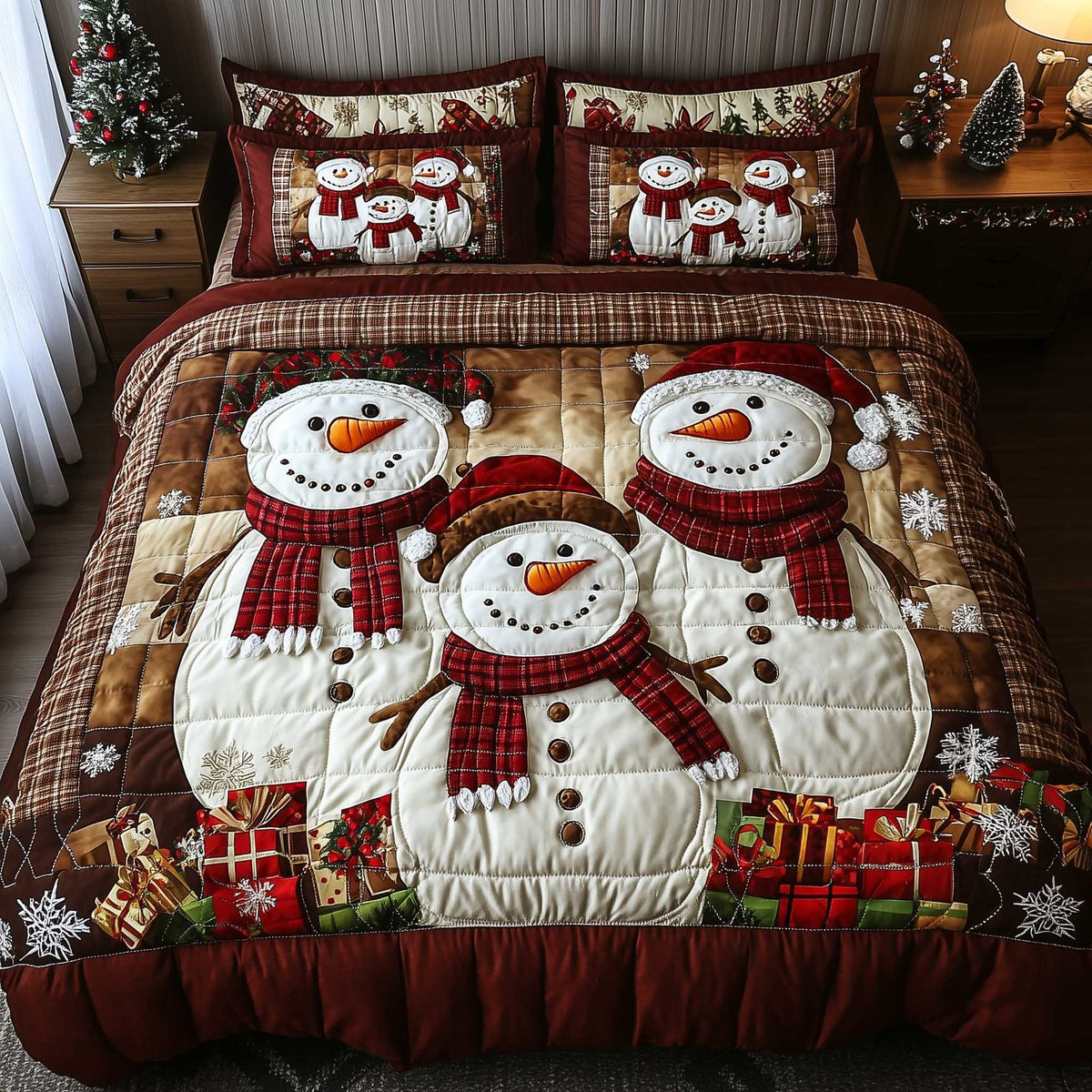 Snowy Companions quilted 3-piece bedding set on a made bed with two matching pillow shams