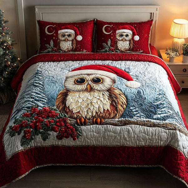 Snowy Owl quilted 3-piece bedding set on a made bed with two matching pillow shams