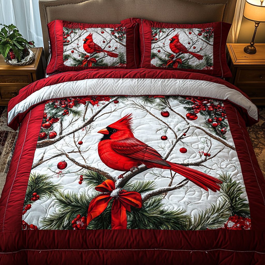 Snowy Perch quilted 3-piece bedding set on a made bed with two matching pillow shams
