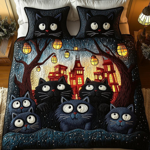 Snuggle Cats quilted 3-piece bedding set on a made bed with two matching pillow shams