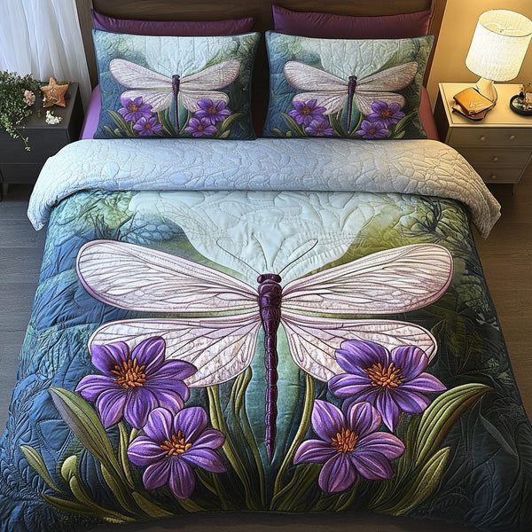 Soft Wings quilted 3-piece bedding set on a made bed with two matching pillow shams