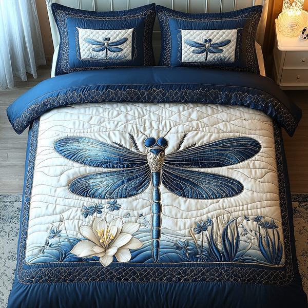 Sparkling Wings quilted 3-piece bedding set on a made bed with two matching pillow shams