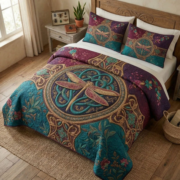 Spirit Dragonfly quilted 3-piece bedding set on a made bed with two matching pillow shams
