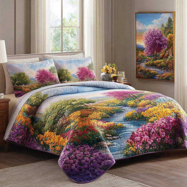 Spring River quilted 3-piece bedding set on a made bed with two matching pillow shams