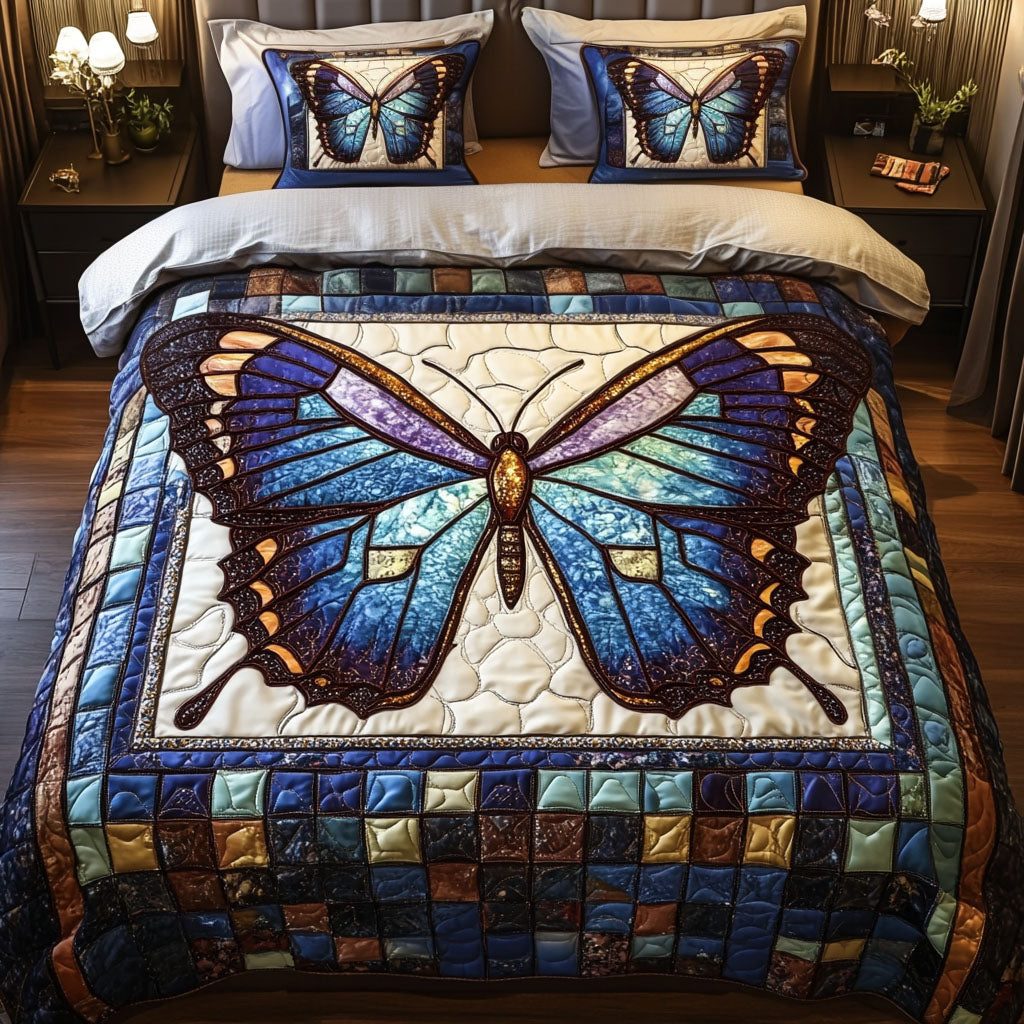 Stained Glass Butterfly quilted 3-piece bedding set on a made bed with two matching pillow shams
