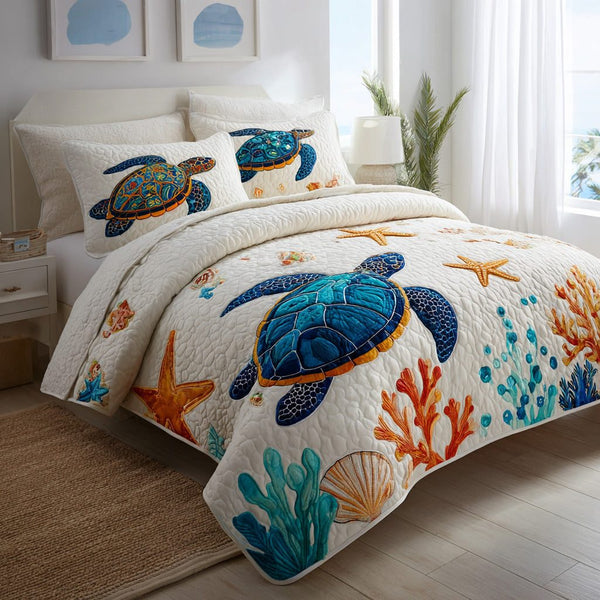 Starfish Serenity quilted 3-piece bedding set on a made bed in a light coastal bedroom