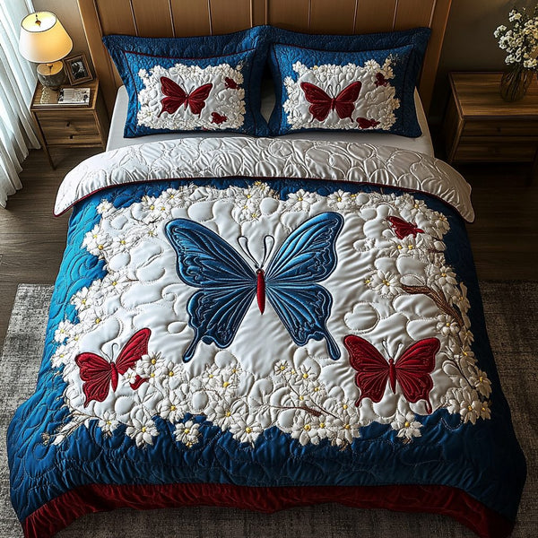 Starlit Butterfly quilted 3-piece bedding set on a made bed with two matching pillow shams
