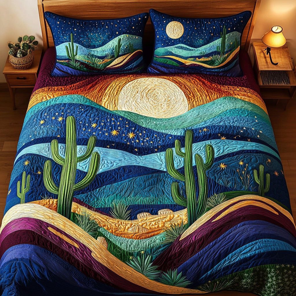 Starlit Canyon quilted 3-piece bedding set on a made bed with two matching pillow shams