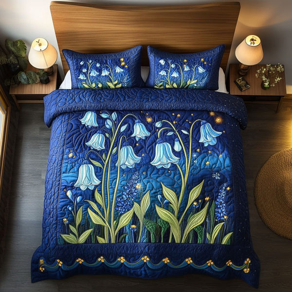 Starlit Flowers quilted 3-piece bedding set on a made bed with two matching pillow shams