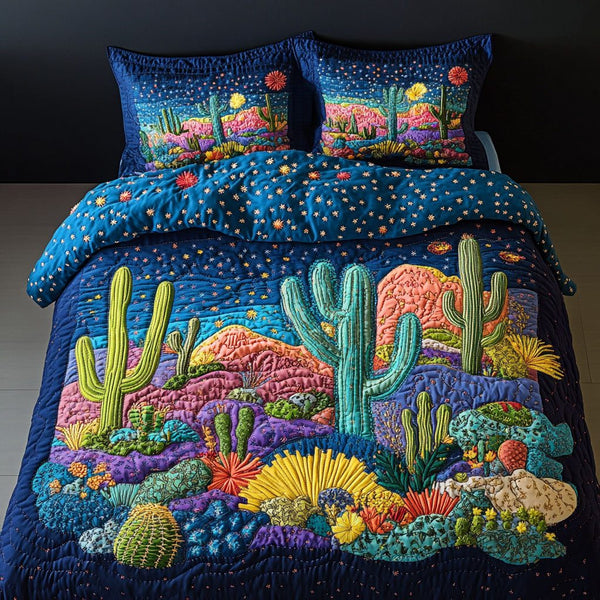Starry Desert quilted 3-piece bedding set on a made bed with two matching pillow shams