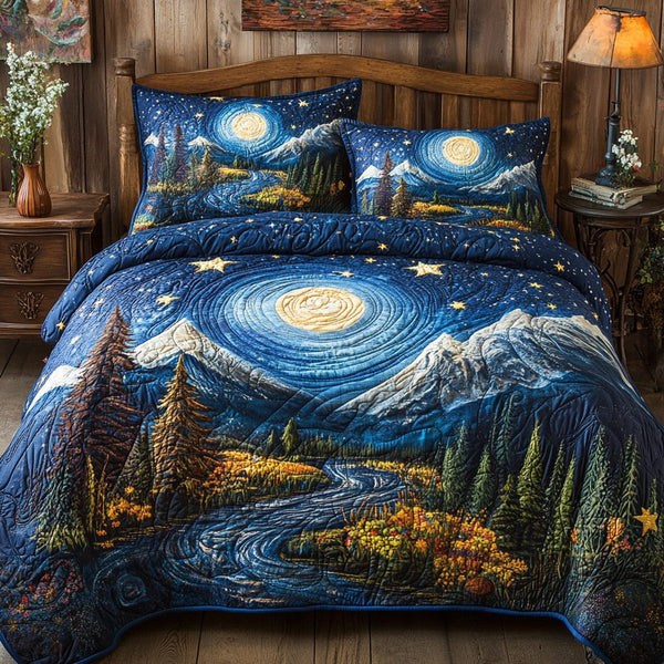 Starry Mountain Escape quilted 3-piece bedding set on a made bed with two matching pillow shams