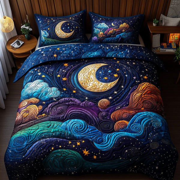 Starry Night quilted 3-piece bedding set on a made bed with two matching pillow shams