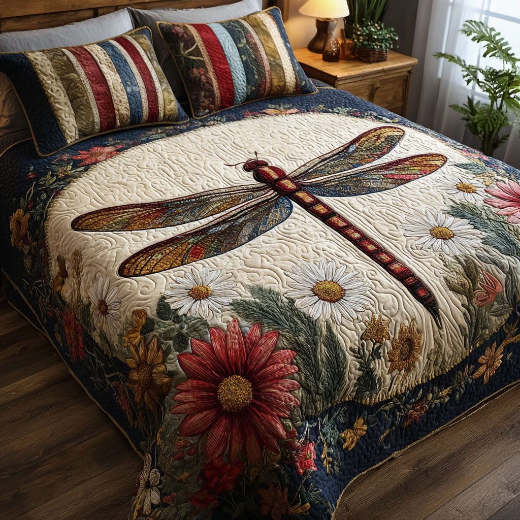 Stars and Stripes Dragonfly quilted 3-piece bedding set on a made bed with two matching pillow shams