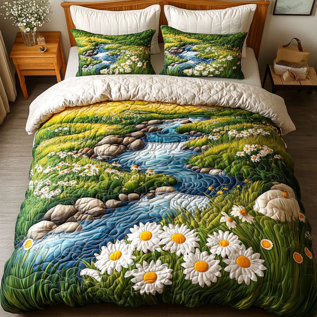 Stream of Daisies quilted 3-piece bedding set on a made bed with two matching pillow shams