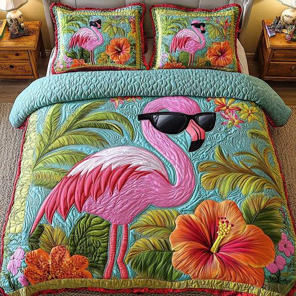 Summer Flamingo quilted 3-piece bedding set on a made bed with two matching pillow shams