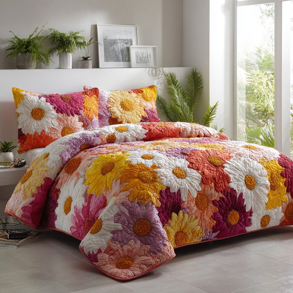 Sunburst Daisies quilted 3-piece bedding set on a made bed with two matching pillow shams