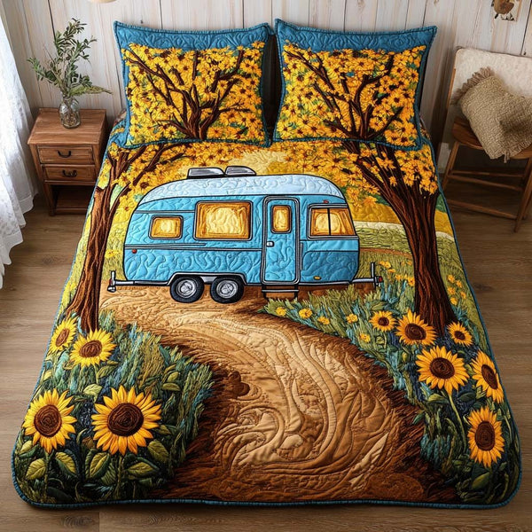 Sunflower Camper Trail quilted 3-piece bedding set on a made bed with two matching pillow shams