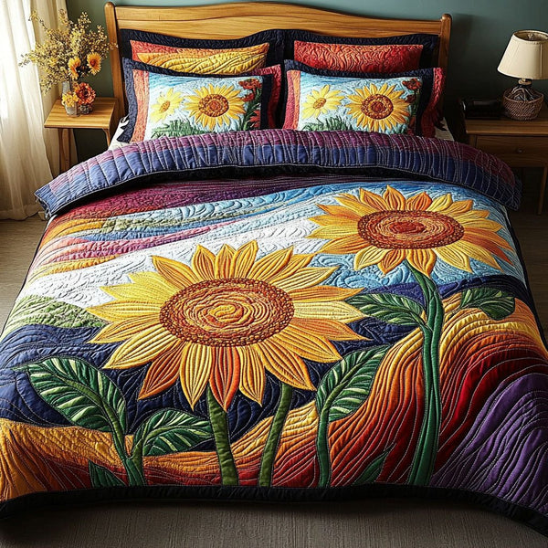 Sunkissed Petal Dreams quilted 3-piece bedding set on a made bed with two matching pillow shams