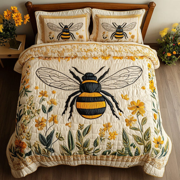 Sunlit Bee quilted 3-piece bedding set on a made bed with two matching pillow shams