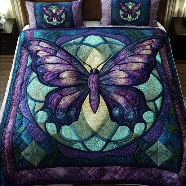 Sunlit Butterfly quilted 3-piece bedding set on a made bed with two matching pillow shams