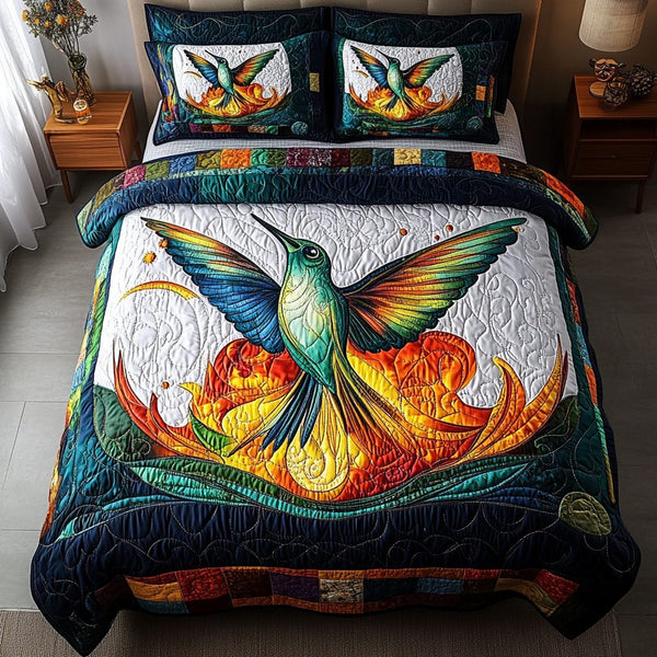 Sunlit Drifter quilted 3-piece bedding set on a made bed with two matching pillow shams