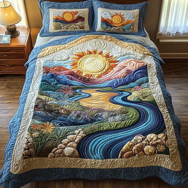 Sunlit Splendor quilted 3-piece bedding set on a made bed with two matching pillow shams