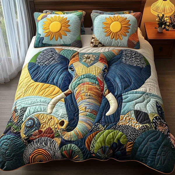 Sunlit Wanderer quilted 3-piece bedding set on a made bed with two matching pillow shams