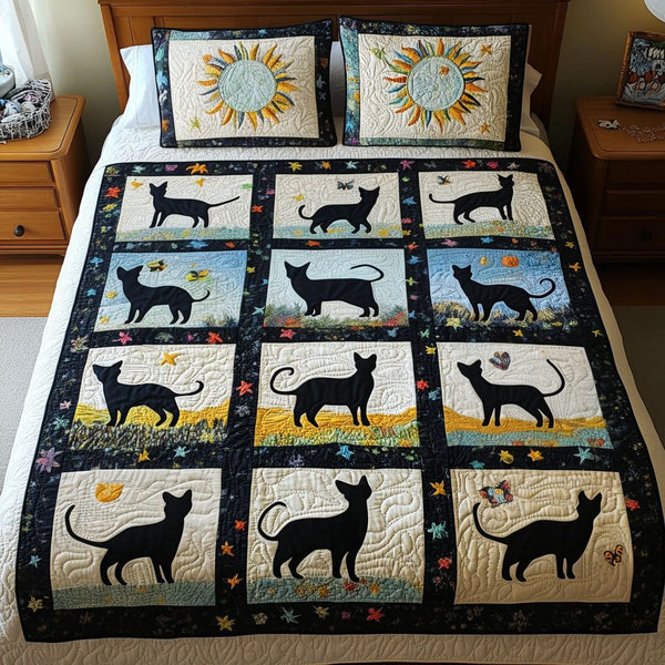 Sunny Cat Meadow quilted 3-piece bedding set on a made bed with two matching pillow shams