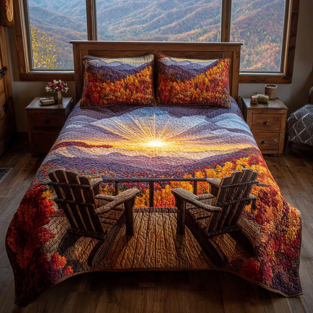 Sunrise Vista quilted 3-piece bedding set on a made bed with two matching pillow shams