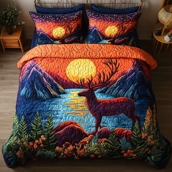 Sunset Elk quilted 3-piece bedding set on a made bed with two matching pillow shams