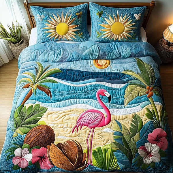Sunset Flamingo quilted 3-piece bedding set on a made bed with two matching pillow shams